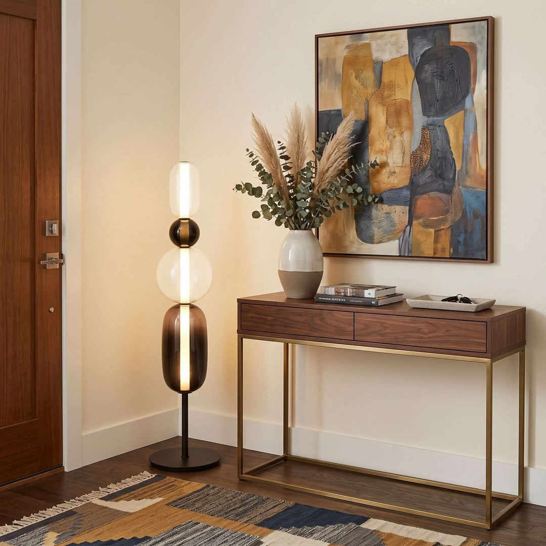 Black Candied Glass Floor Lamp Model B beside a walnut console in an entryway