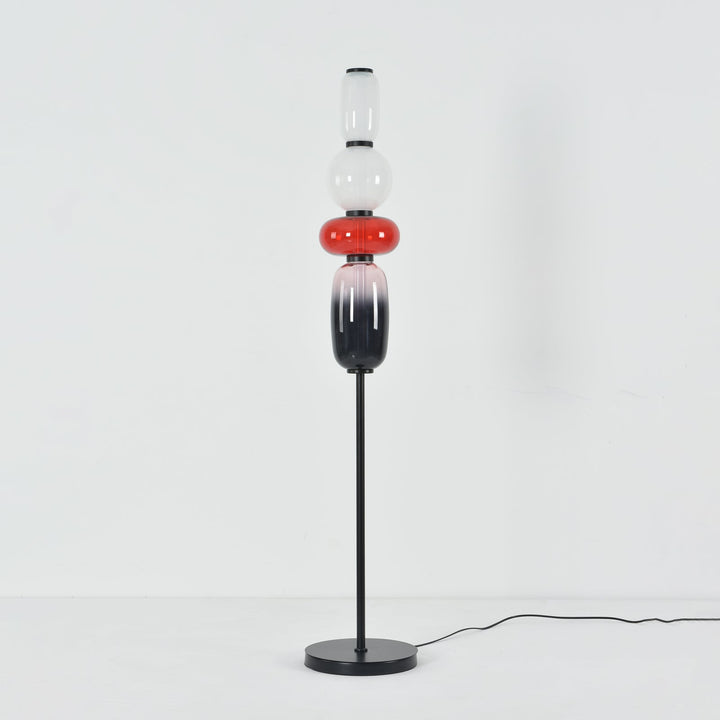 Unlit Candied Model A Red floor lamp showing its clear, red, and smoky stacked glass shades.