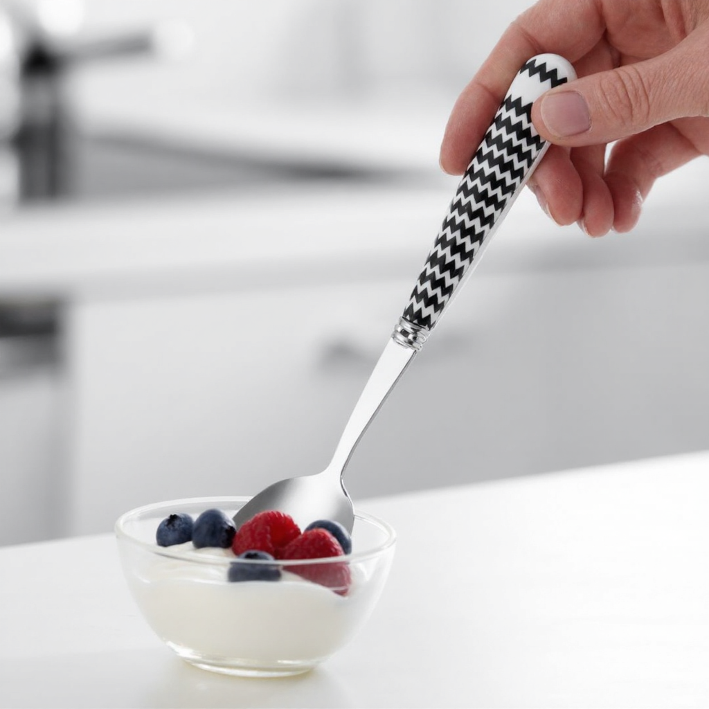 Chevron ceramic handle cutlery spoon in use