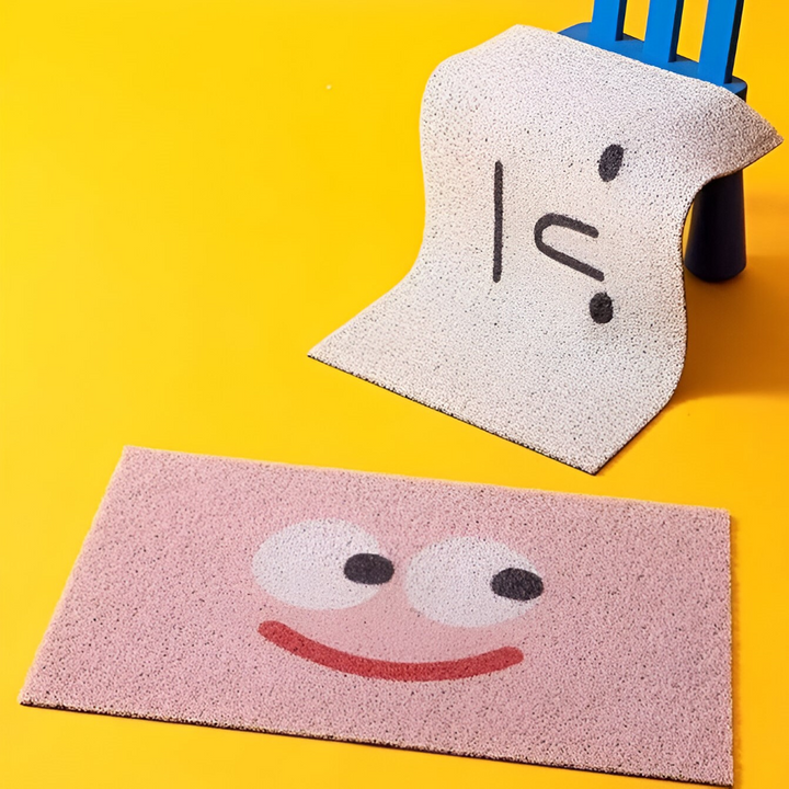 Cheeky Smiley Print Doormat draped texture and pink design detail