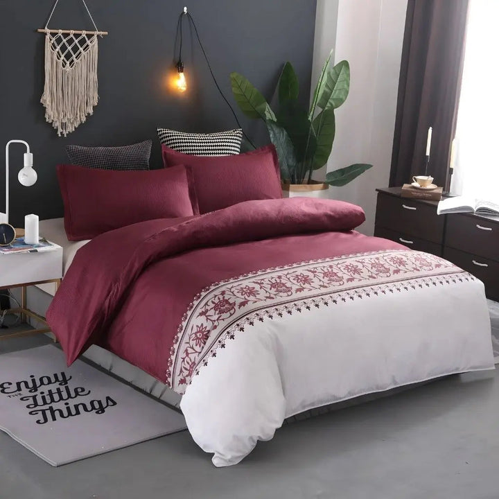 Wine Red Botanical Border Duvet Cover Set on bed front view