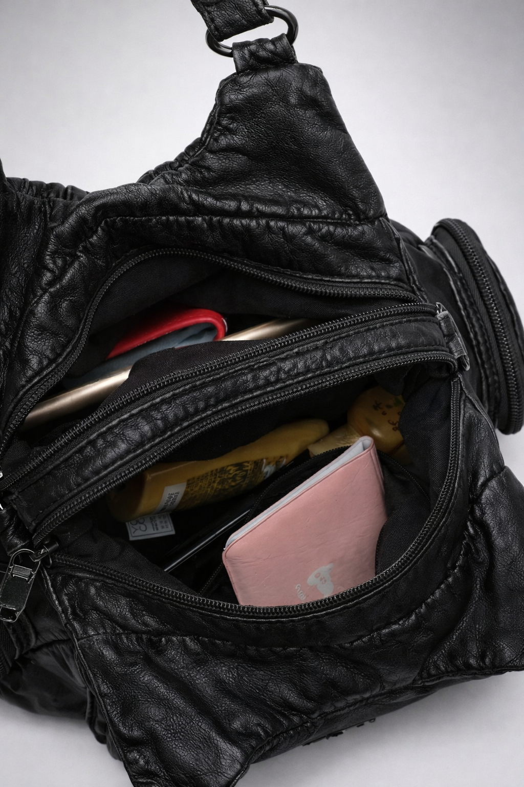 Black Compact Vegan Leather Shoulder Bag interior detail