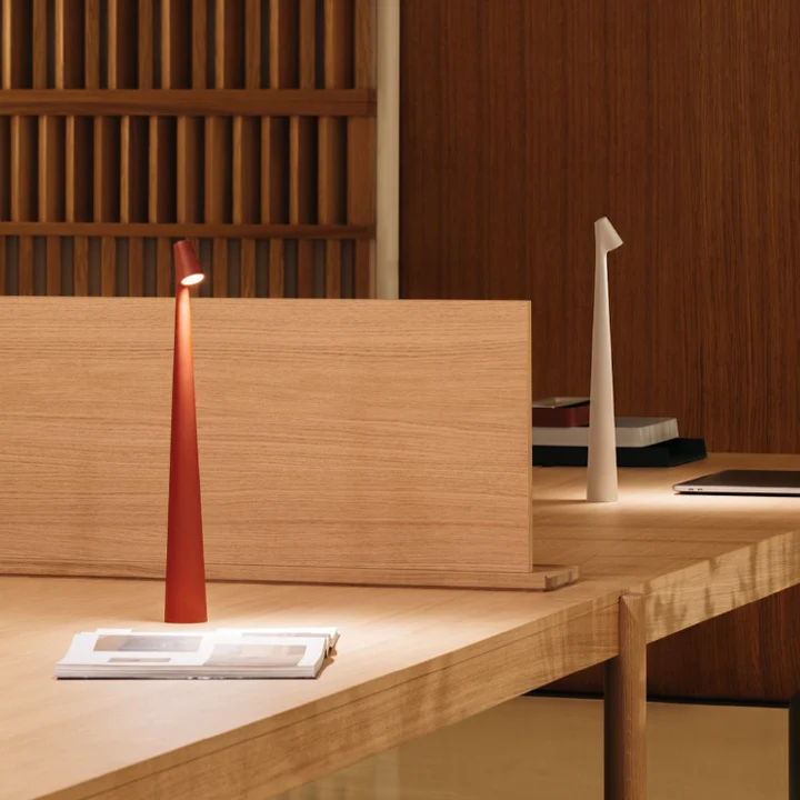 Red and White Cordless Cone Table Lamps on desk