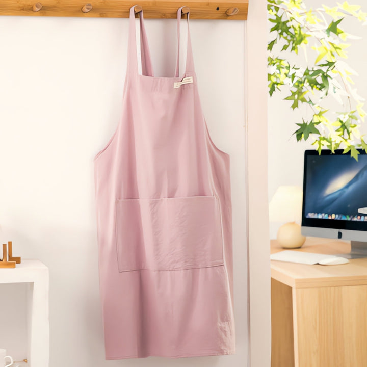 Light Pink Cotton Cross-Back Apron hanging front view