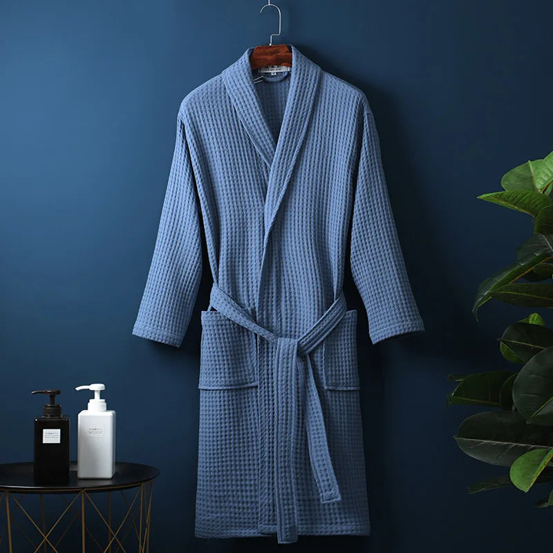 Blue Cotton Shawl-Collar Bathrobe on a hanger, front view