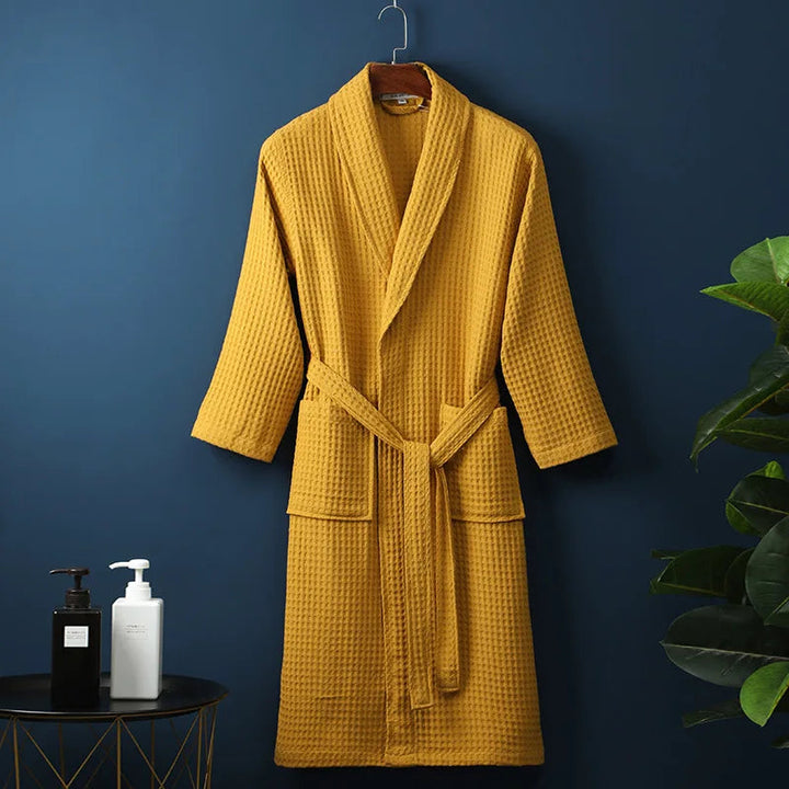 Yellow Cotton Shawl-Collar Bathrobe on a hanger, front view
