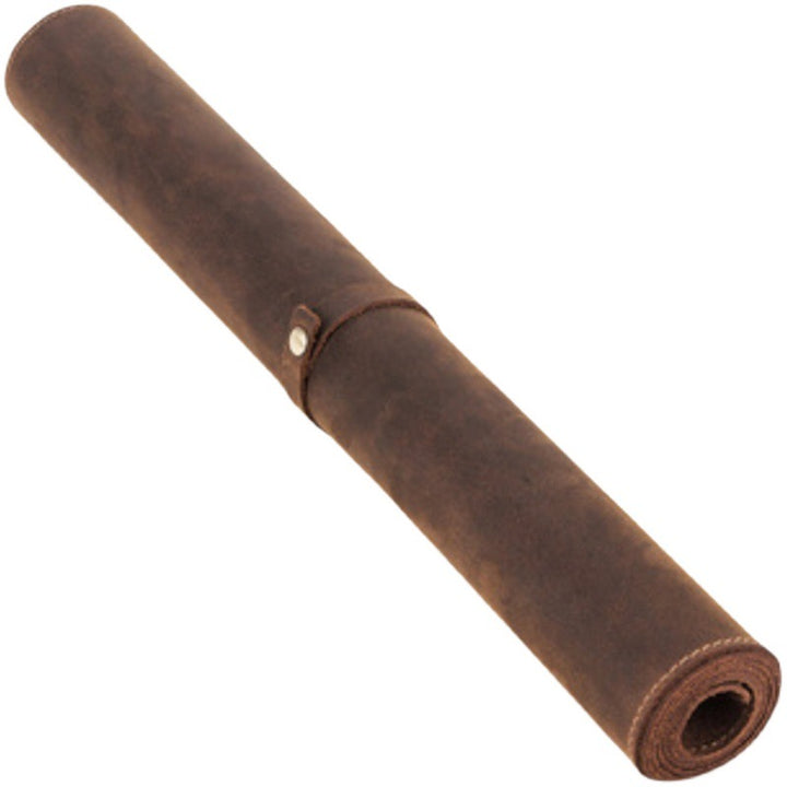 Leather desk mat rolled up for storage