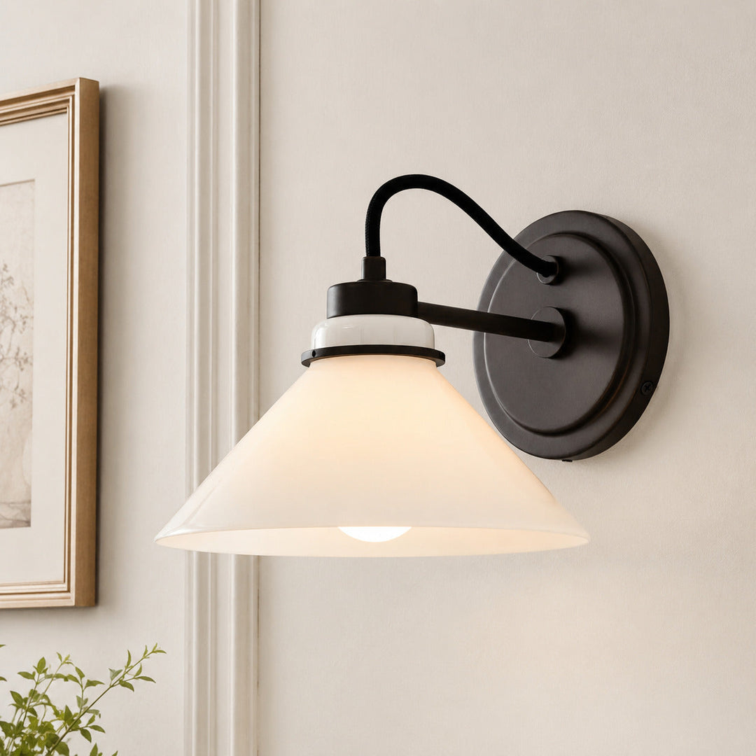 Milk Glass Curved Arm Cone Wall Sconce, mounted on wall