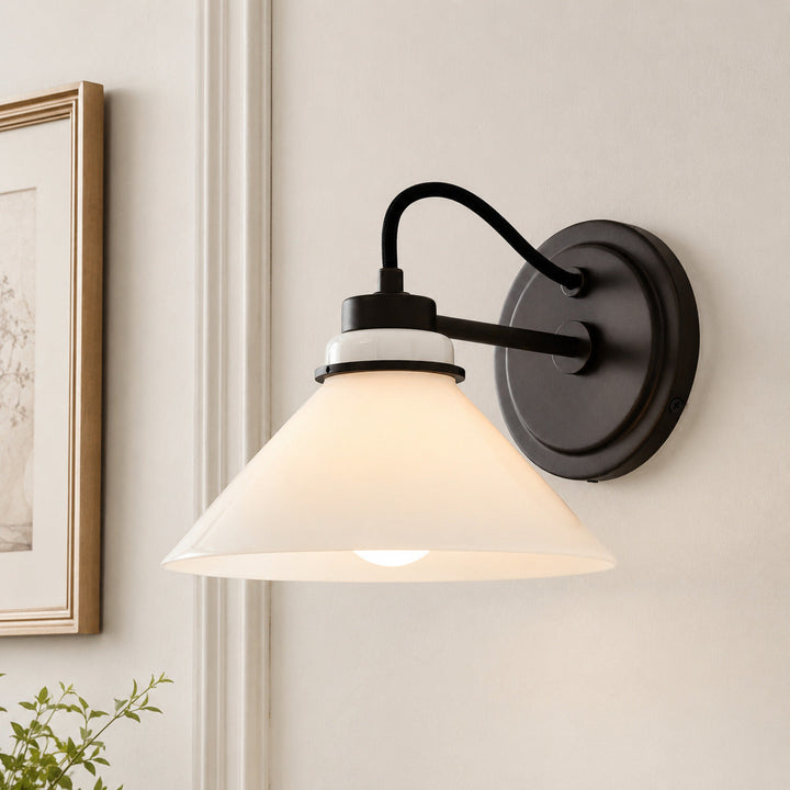 Milk Glass Curved Arm Cone Wall Sconce, mounted on wall