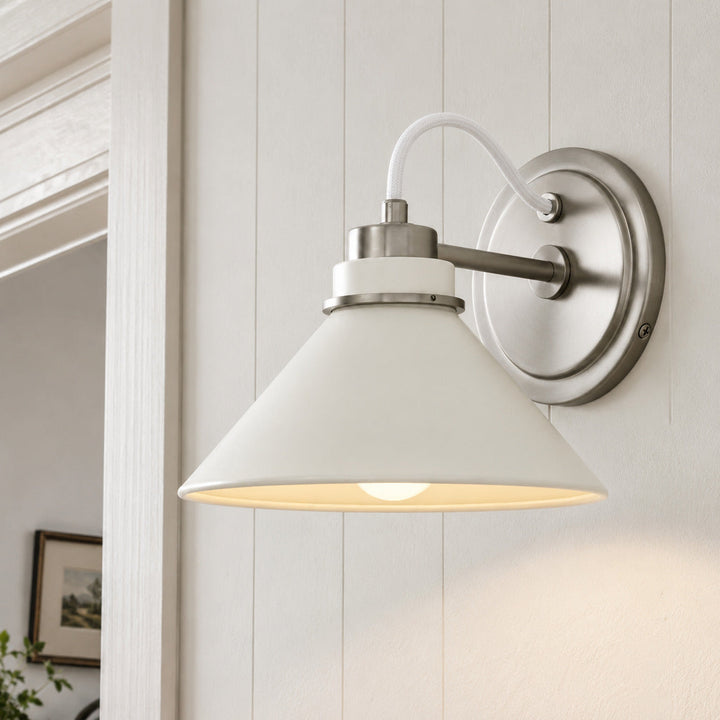 Ivory Metal Curved Arm Cone Wall Sconce, angled view