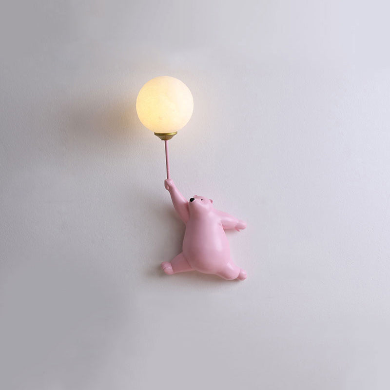Blue Resin Bear Balloon Wall Lamp lit at night