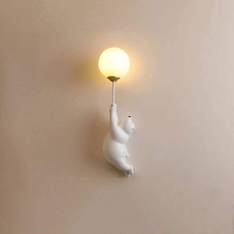 White Resin Bear Balloon Wall Lamp lit at night
