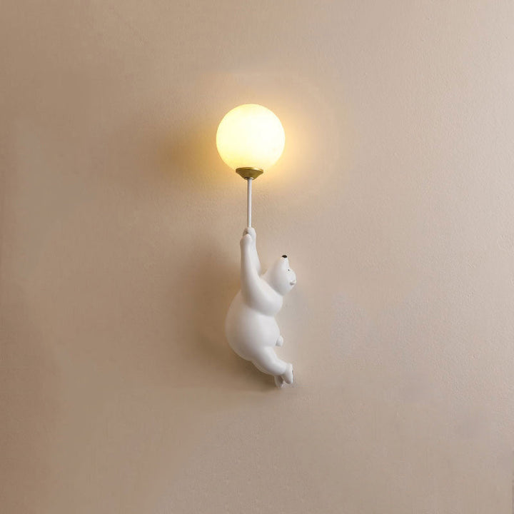 White Resin Bear Balloon Wall Lamp lit at night