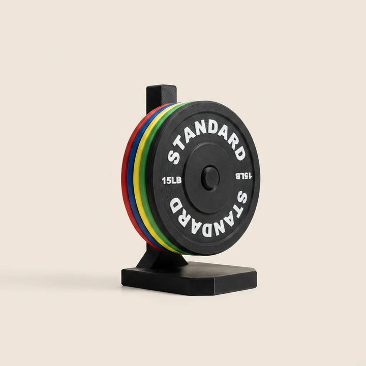 Multicolor Barbell Plate Coaster Set full view on stand