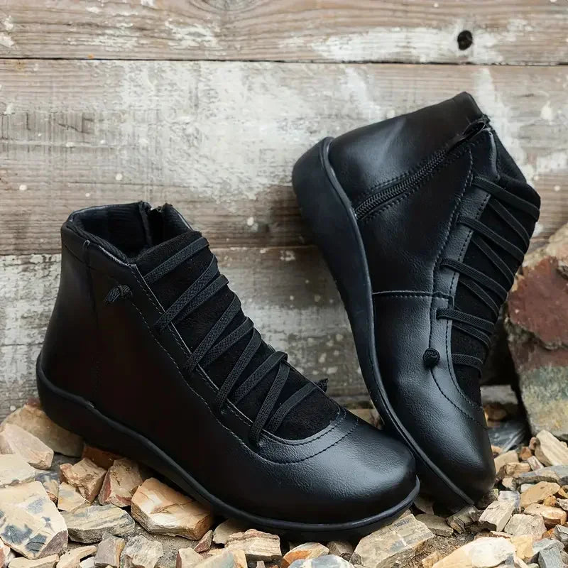 Black Faux Leather Zip-Up Boots pair on display