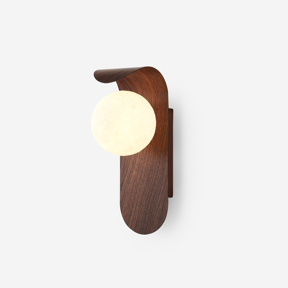 Natural Wood Faux-Wood Curved Arm Sconce lit on wall