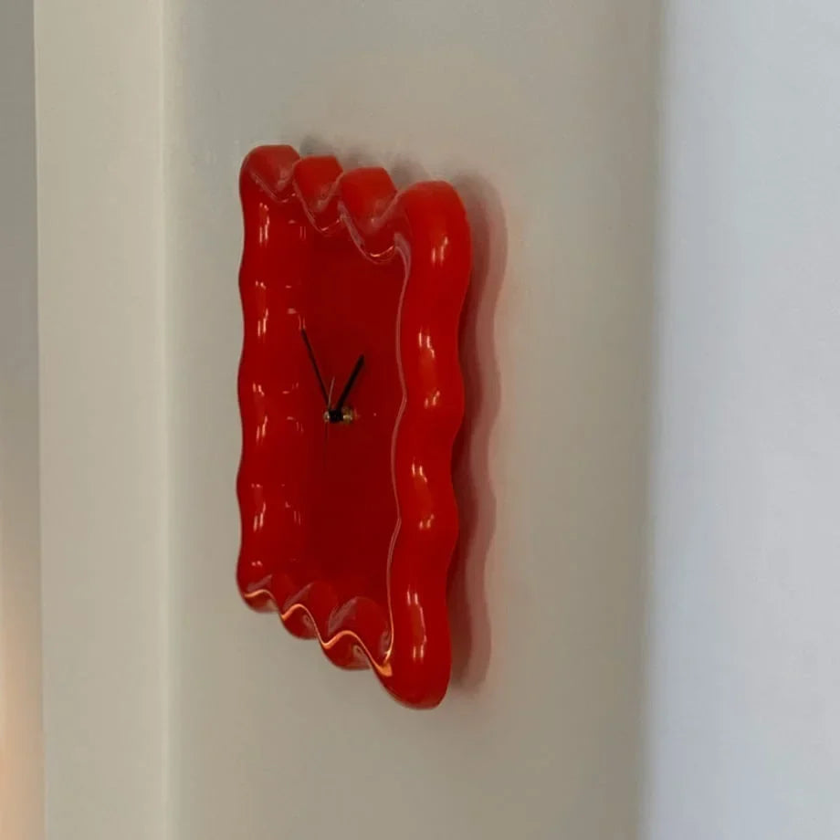 Glossy Melamine Squiggle Wall Clock on desk