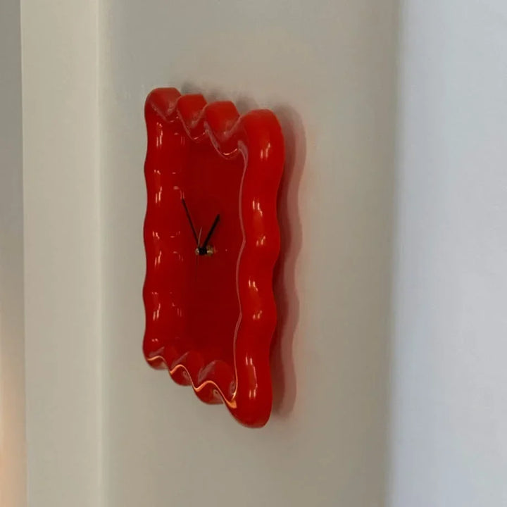 Glossy Melamine Squiggle Wall Clock on desk