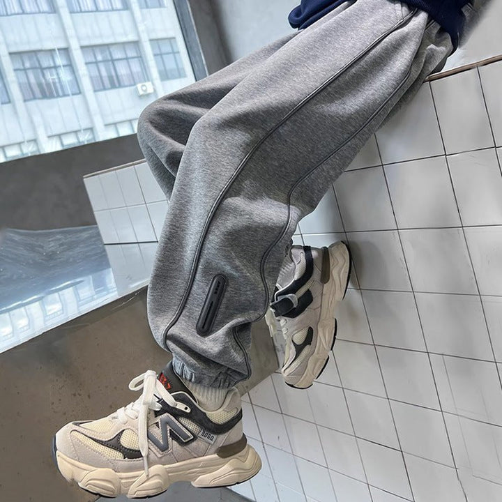 Gray Fleece Jogger Pants seated lifestyle