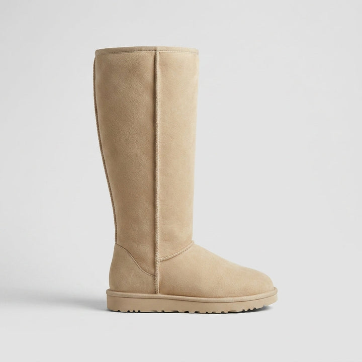 Beige fleece-lined knee-high boot side view