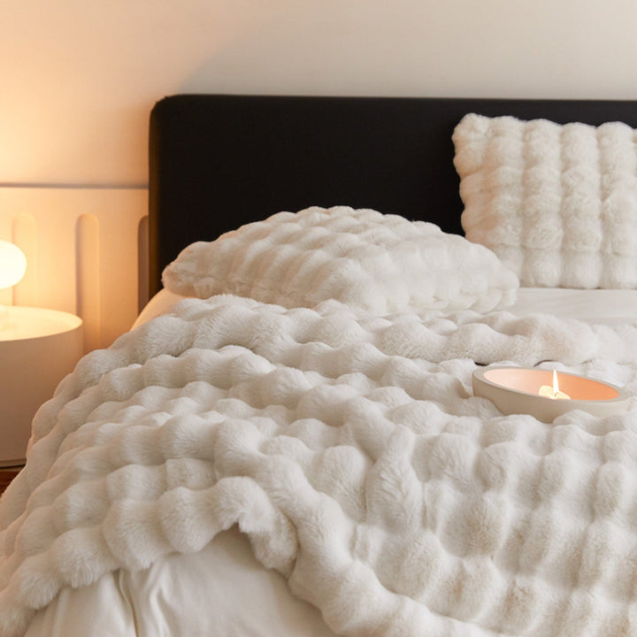 Fluffy Glam Faux Fur Blanket on sofa lifestyle