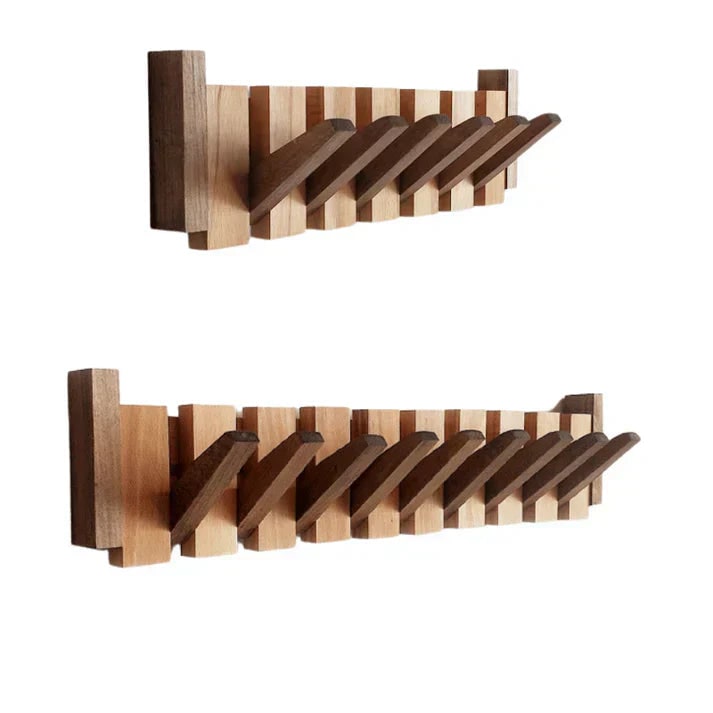Folding wooden coat rack shown in light and dark wood finishes