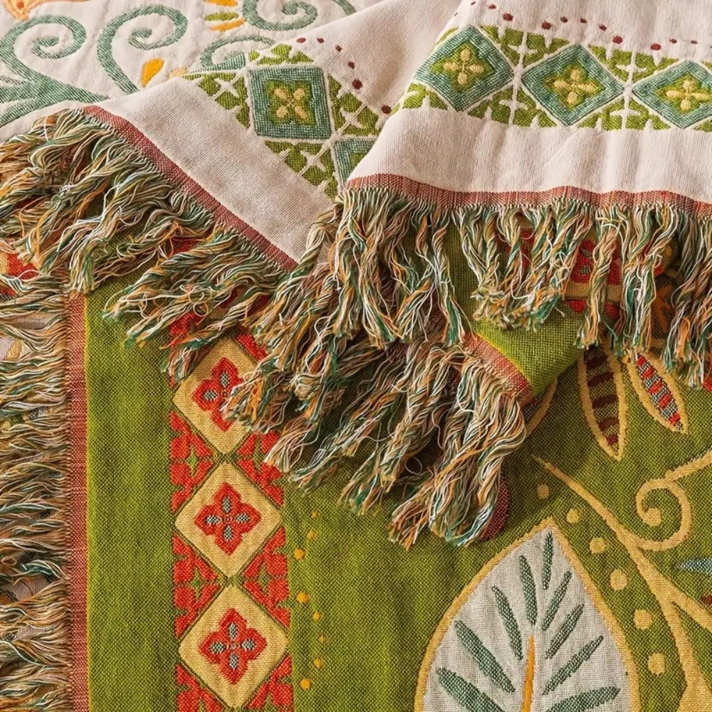 Midnight Leaf Foliage Print Cotton Gauze Throw tassel and weave detail
