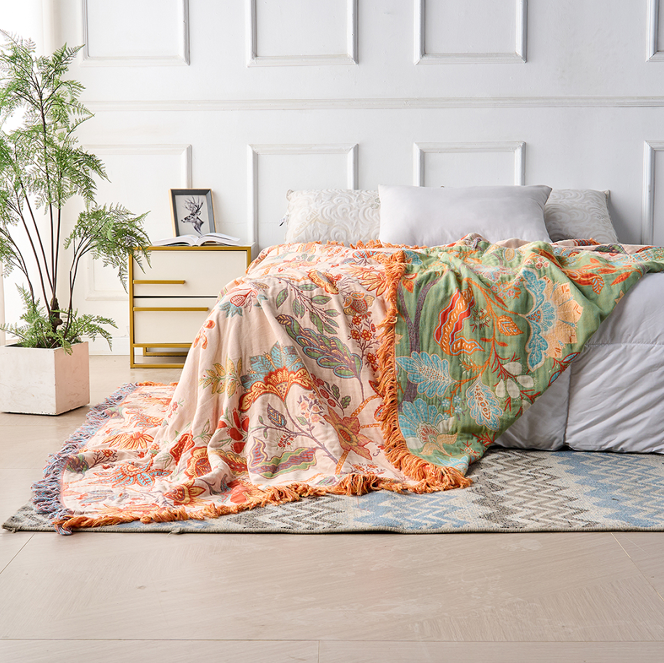Fringed Cream Floral Cotton Throw in a living room