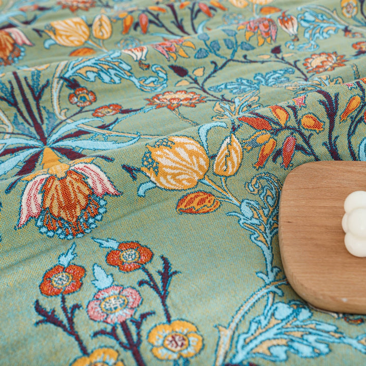 Fringed Floral Cotton Bedspread Throw styled on a bed