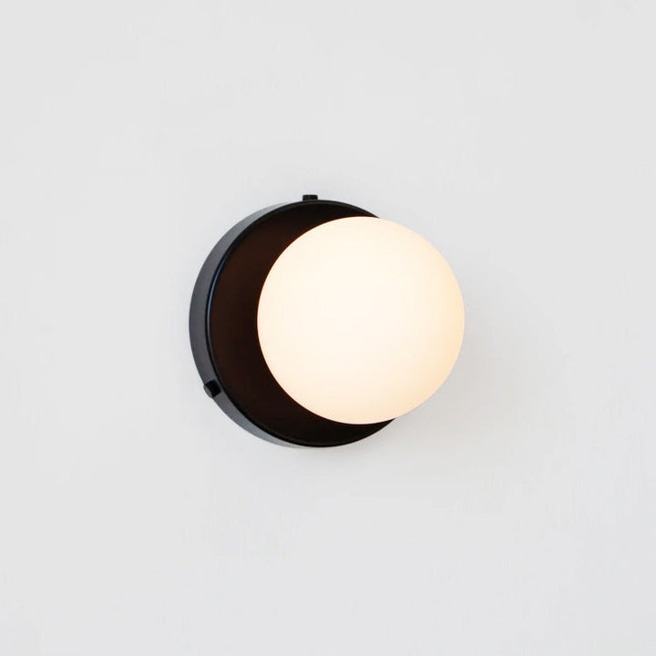 Glass Globe Wall Sconce lit glow detail