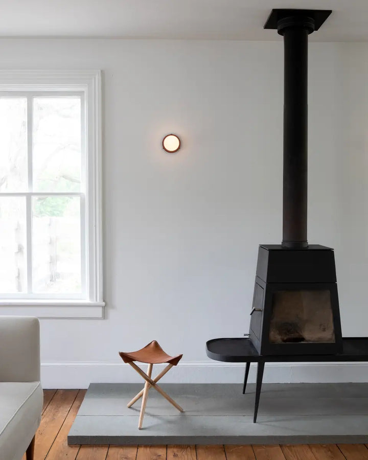 Glass Globe Wall Sconce installed in hallway