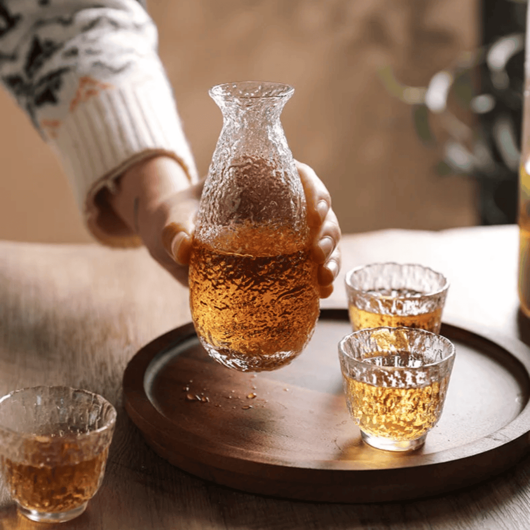 Clear Glass Sake Set with Ice Bucket pouring lifestyle