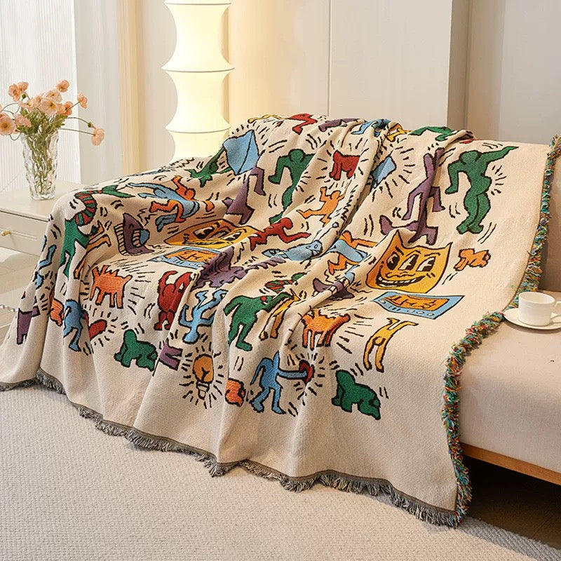 Multicolor Graffiti Pop Art Woven Throw Blanket covering sofa