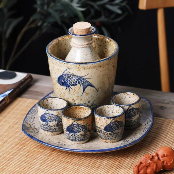 Hand-Glazed Koi Sake Carafe Set on round tray lifestyle