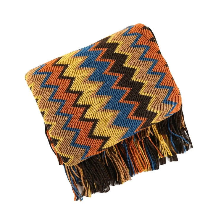Multicolor Hand-Knit Chevron Throw Blanket folded with tassels