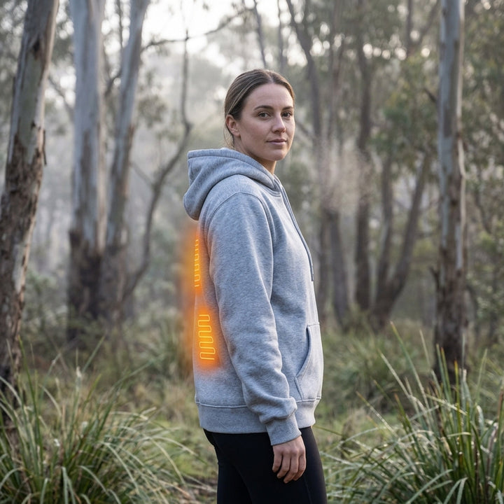 Grey heated zip-up hoodie worn outdoors