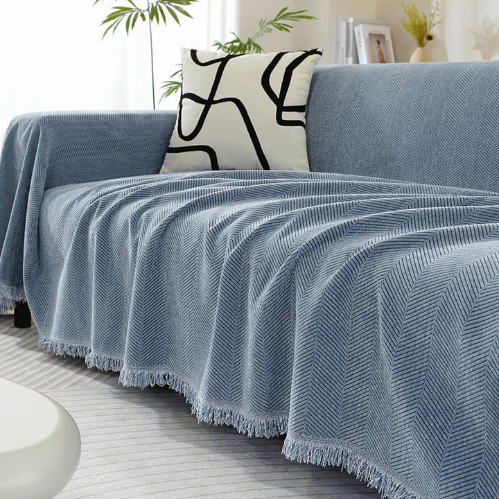 Blue Herringbone Chenille Sofa Throw draped over sofa
