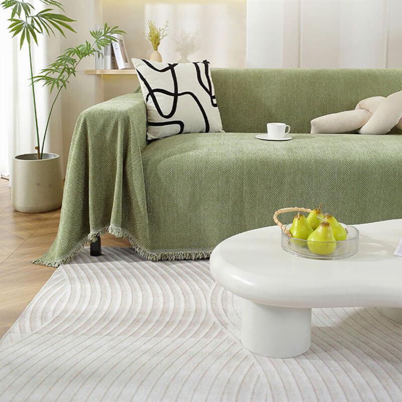 Green Herringbone Chenille Sofa Throw in living room