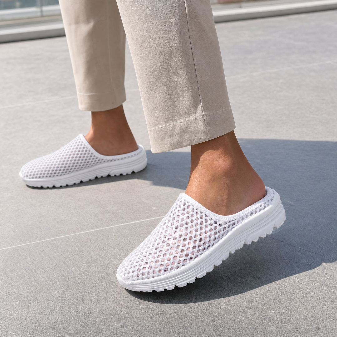 White Orthopedic Mesh Slip-On Sneakers close-up worn