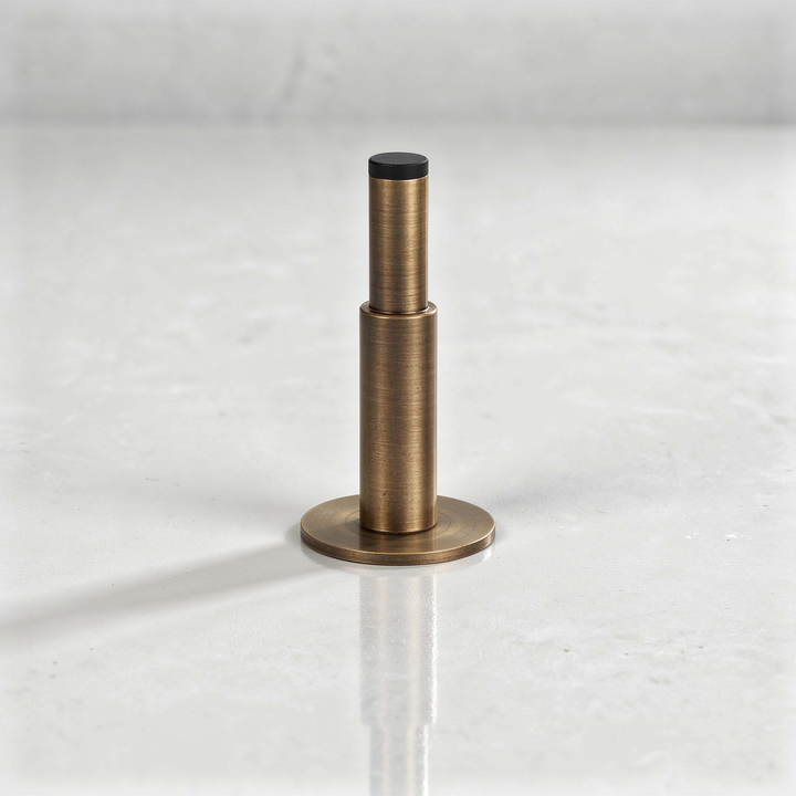 Antique Brass Minimalist Door Stopper finish photo