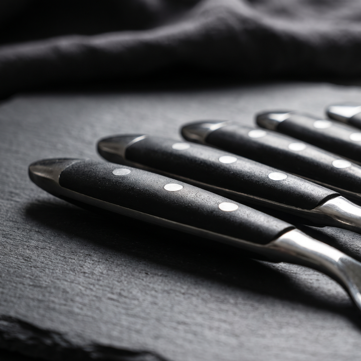 Elegant Black Stainless Steel Cutlery matte black handle macro detail