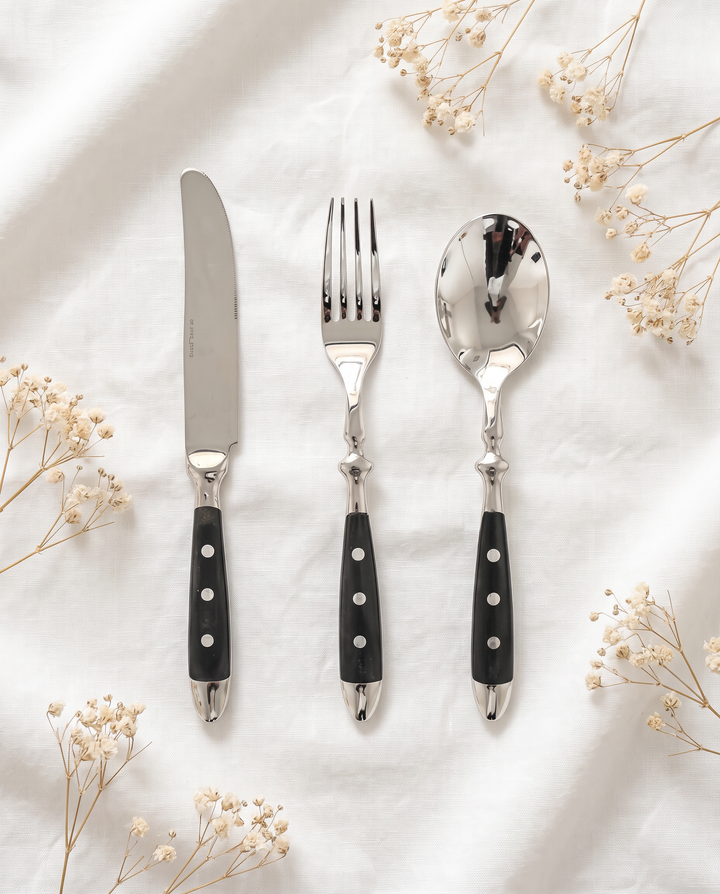 Elegant Black Stainless Steel Cutlery 3-piece set flat lay on linen