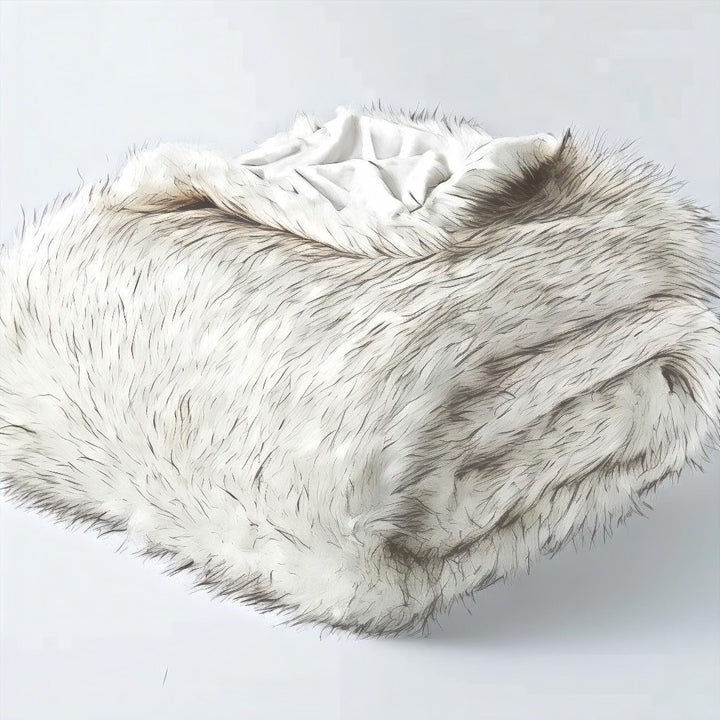 Hotel-Style Faux Fur Throw Blanket on sofa lifestyle