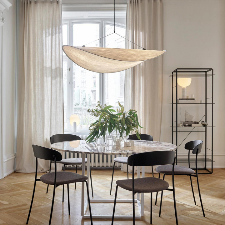 Japandi Silk Pendant Light hanging over dining table