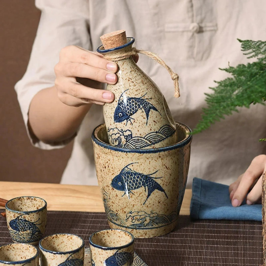 Koi Ceramic Sake Set carafe placed in warming pot