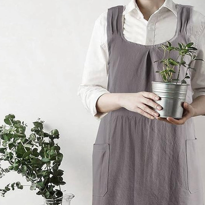 Gray Korean-Style Pinafore Apron worn while gardening