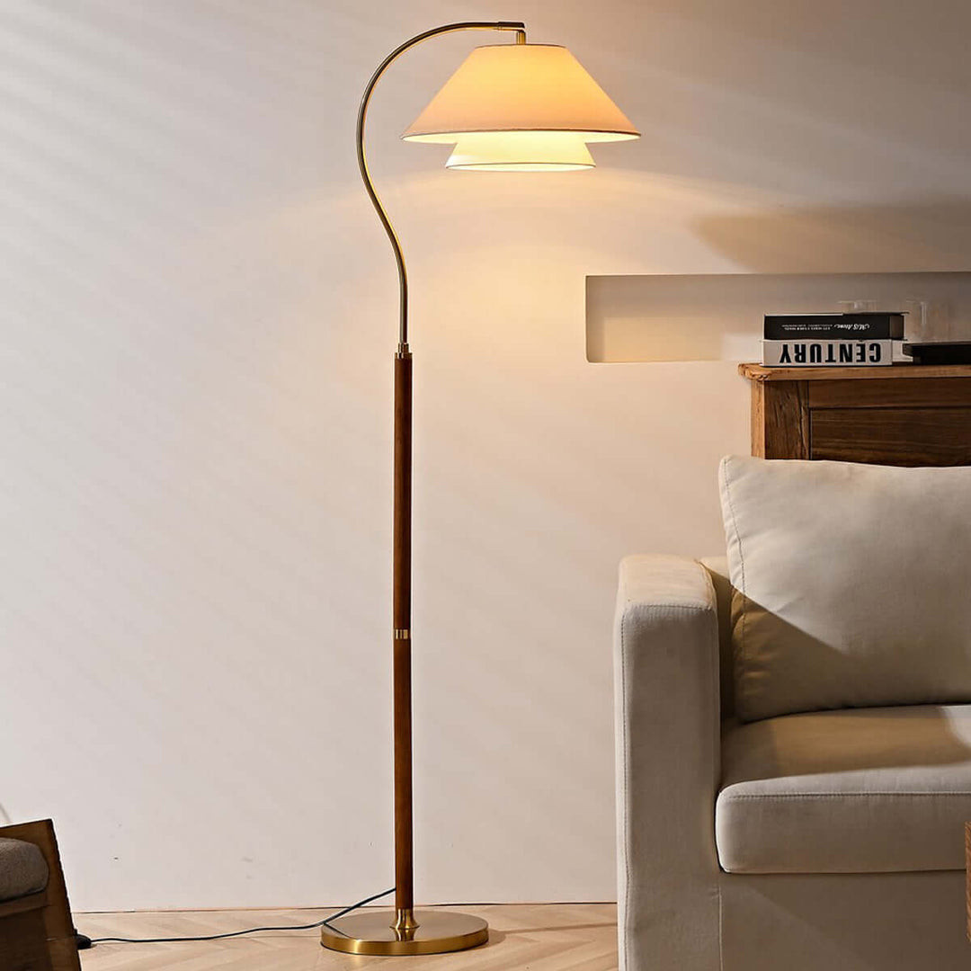 Walnut Layered Fabric Shade Arc Lamp beside sofa alternate angle