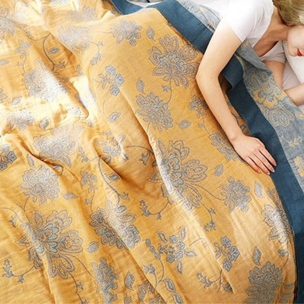 Yellow Layered Gauze Floral Cotton Throw lifestyle on a bed