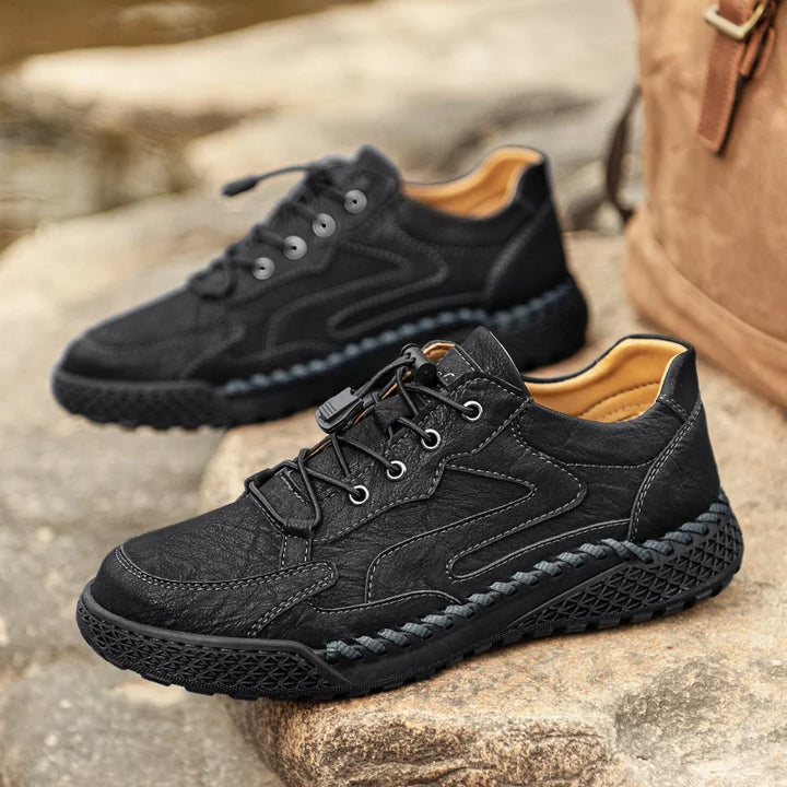 Black Leather Hiking Shoes pair outdoors