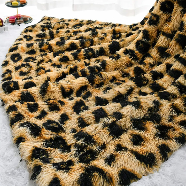 Leopard Print Faux Fur Throw on bed lifestyle